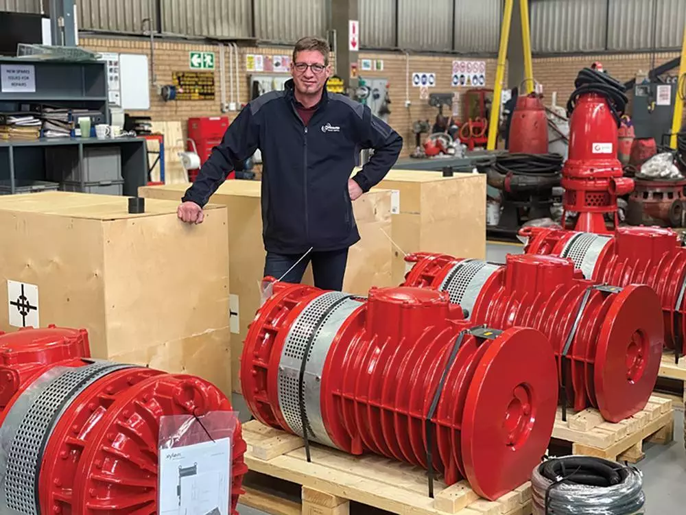 Fred Slabbert, workshop manager at Integrated Pump Technology, with Grindex Mega pumps ready for dispatch to a customer.